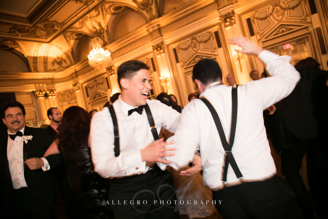 groom dances with groomsman