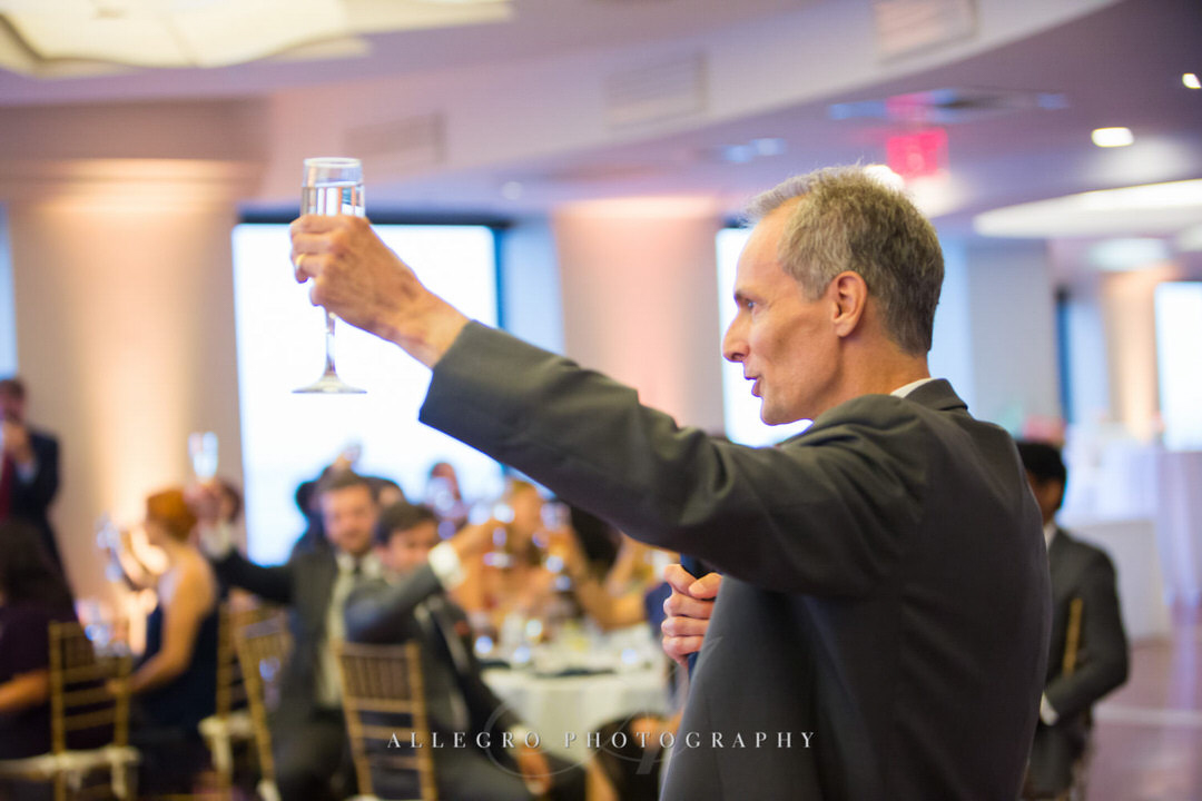 father of the bride cheers after his toast