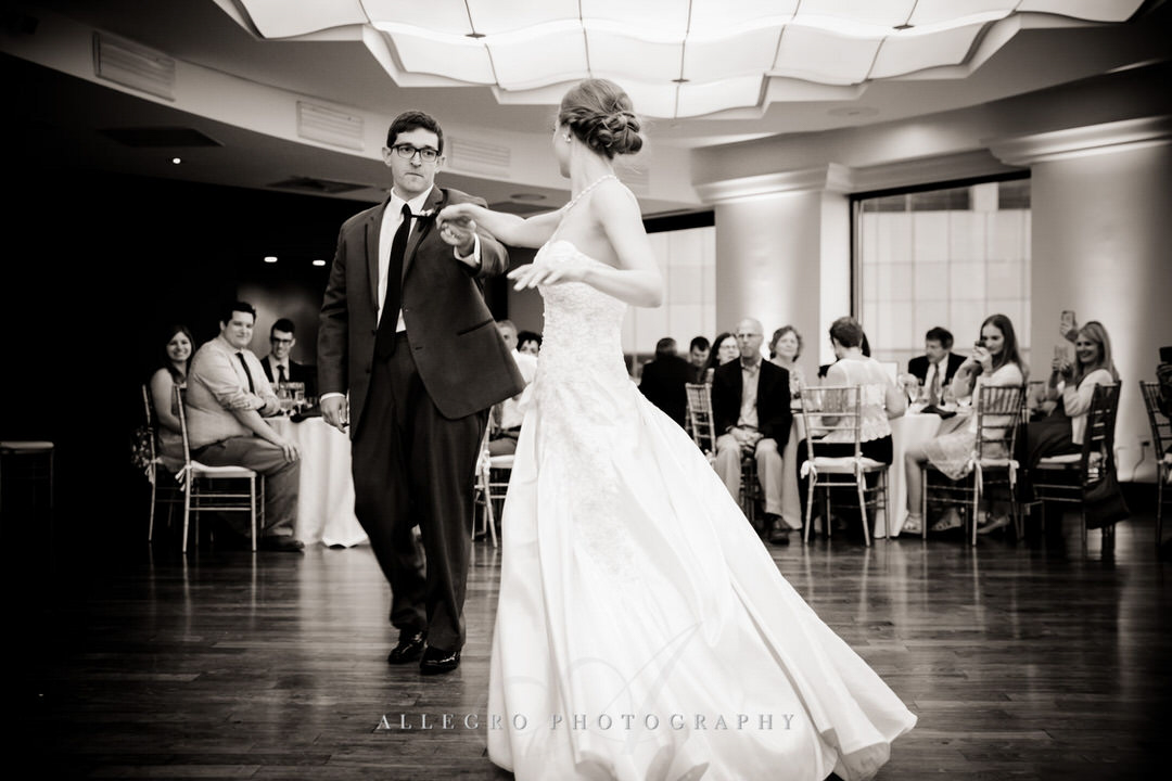 groom spins bride during their first dance