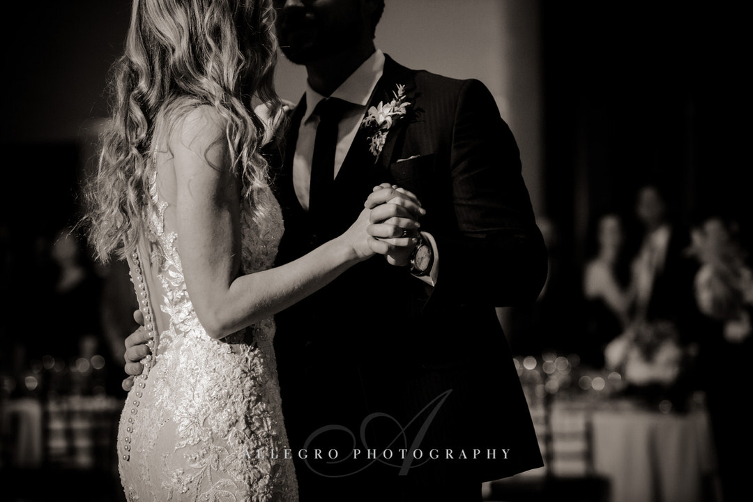bride and groom dance in black and white