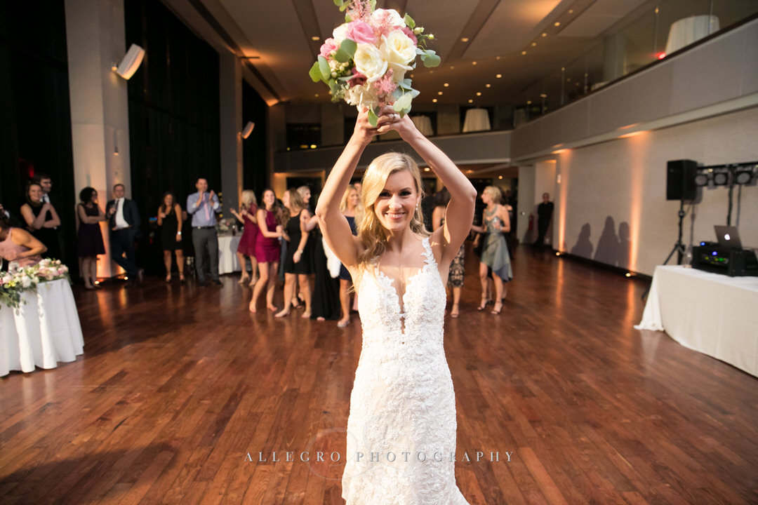 bride throws bouquet